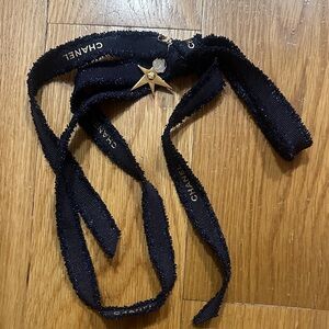 CHANEL Black Ribbon with Gold Star Accent